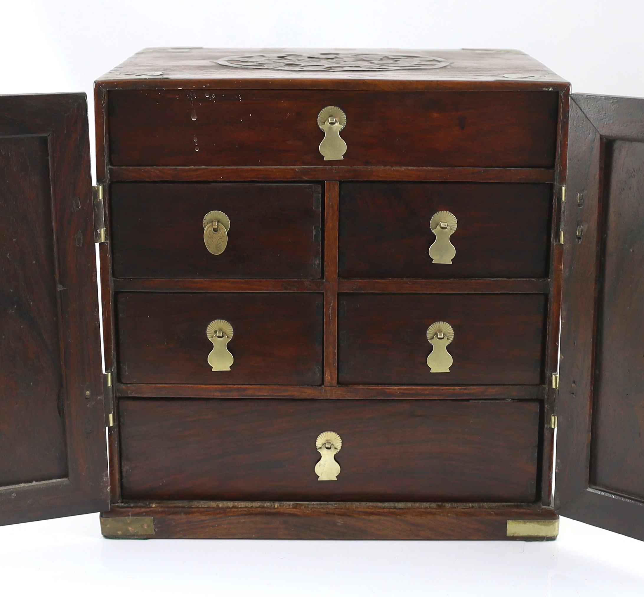 A Chinese brass mounted huanghuali and hardwood seal cabinet, Qing dynasty